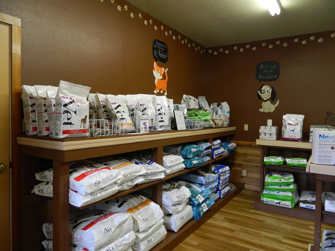 An assortment of large food bags stored at All Creatures Veterinary Clinic