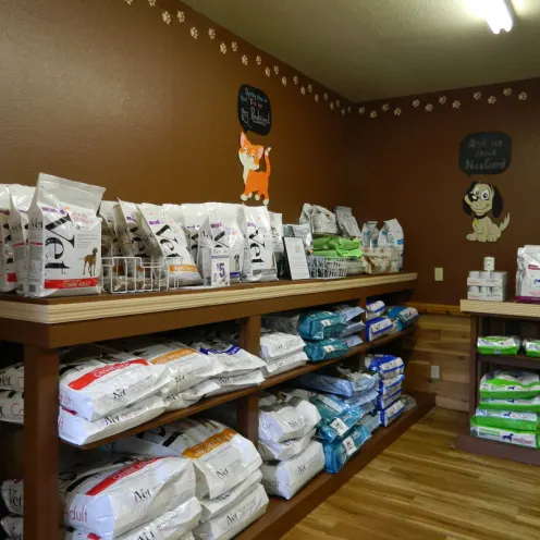 An assortment of large food bags stored at All Creatures Veterinary Clinic