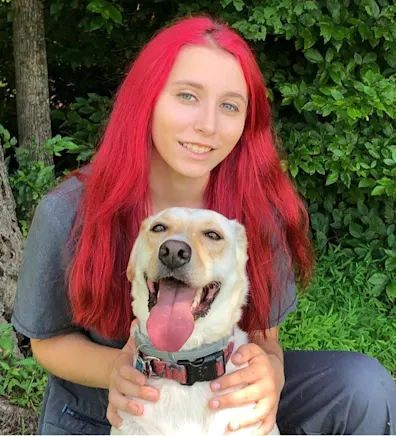 Courtney with large dog Courtney with large dog