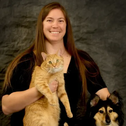 Dr. Cassie Schiller-Rauch with orange cat