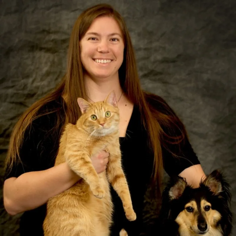 Dr. Cassie Schiller-Rauch with orange cat Dr. Cassie Schiller-Rauch with orange cat