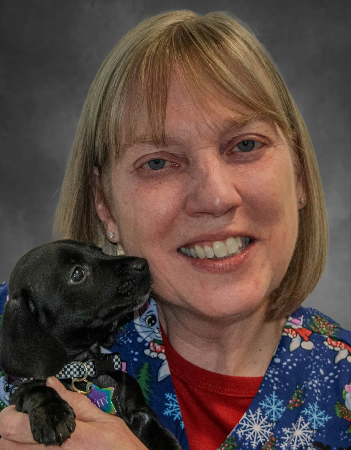 Jill Meunier posing with a Yorkie Jill Meunier posing with a Yorkie