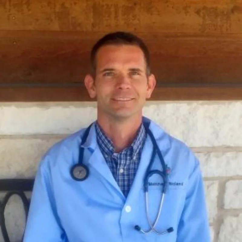 Dr. Noland smiling at the camera Dr. Noland smiling at the camera
