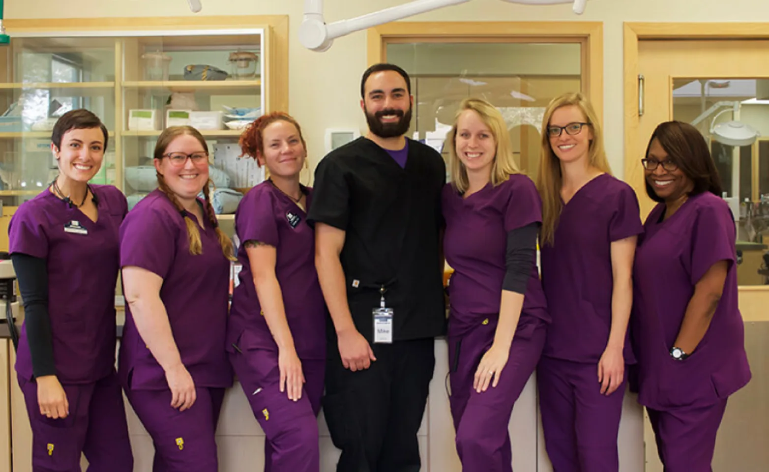 Small staff photo in purple at Overland Animal Hospital