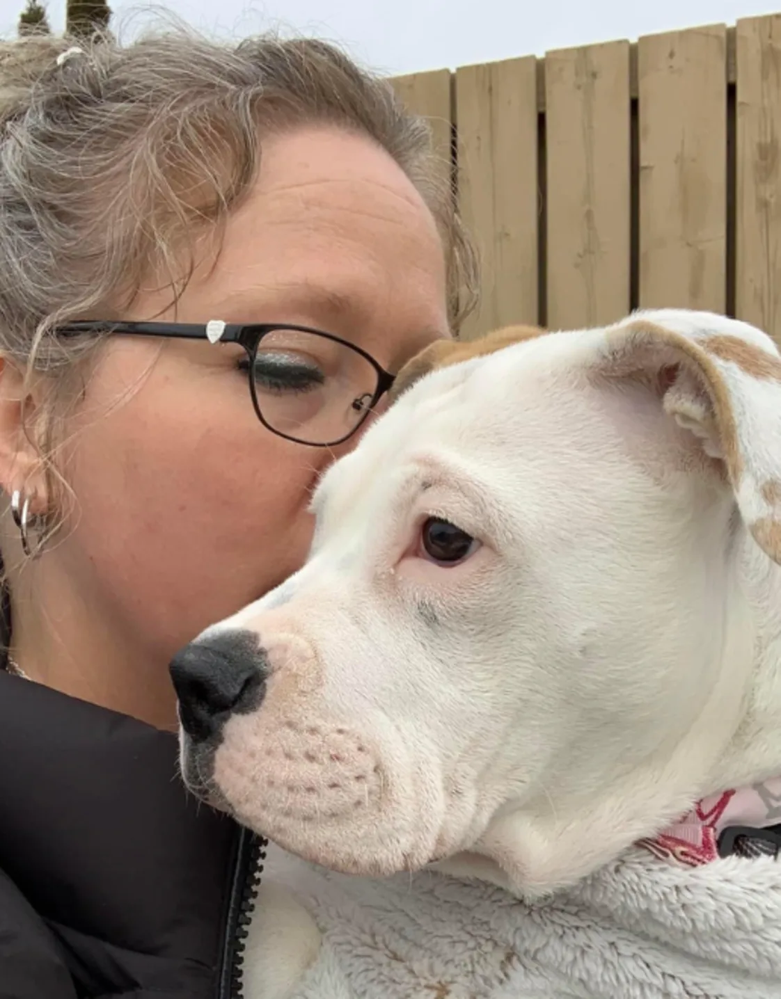Staff photo of STAFF Cheri-Lynn and a dog Staff photo of STAFF Cheri-Lynn and a dog