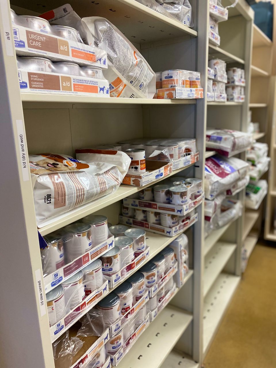 Dog food on shelves.