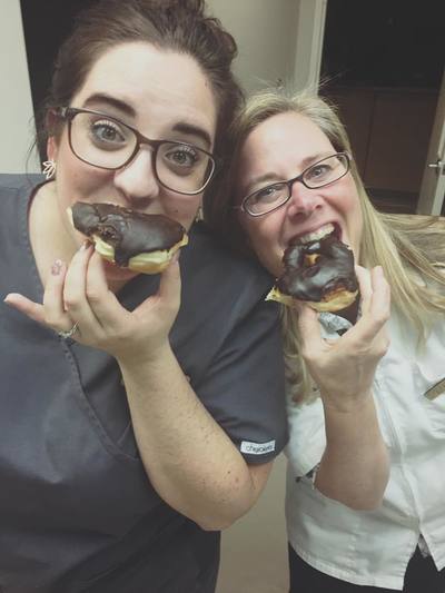 Staff eating donuts