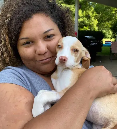 Taleah, holding a dog