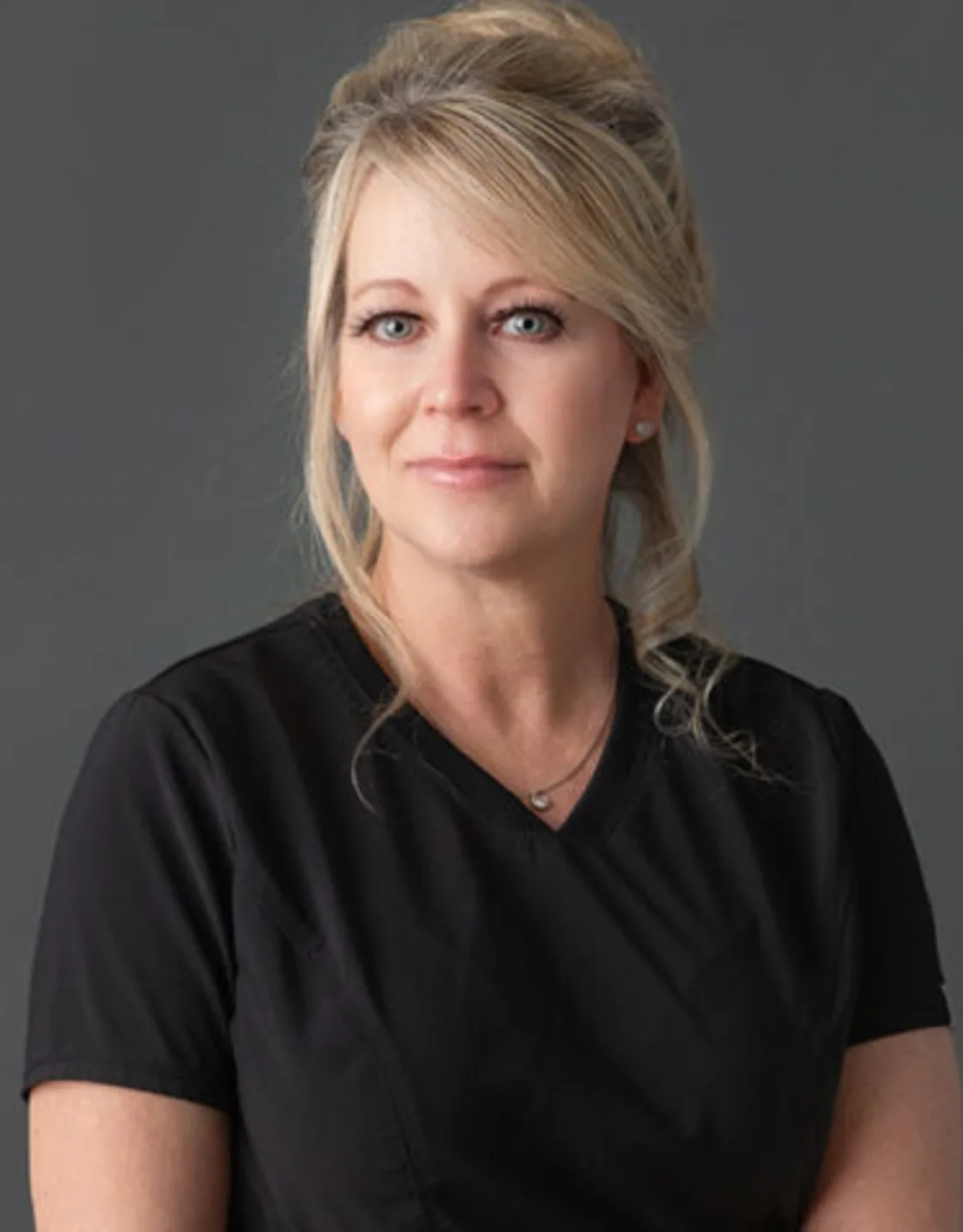 headshot of Tama headshot of Tama