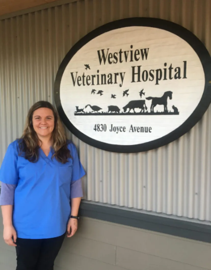 Dr. Elsie-Dawn Standing next to the Westview Sign