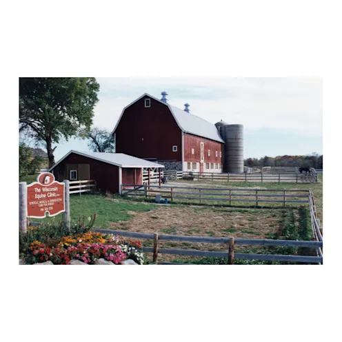 An older photo of the front of WECH's red barn An older photo of the front of WECH's red barn