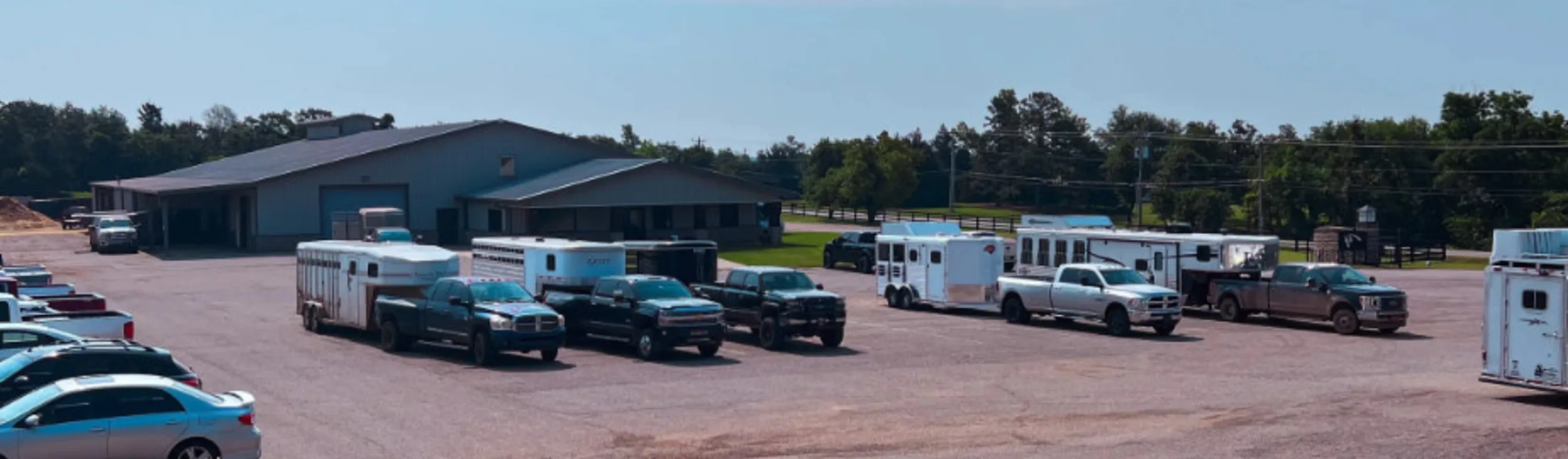 Trucks outside of barn