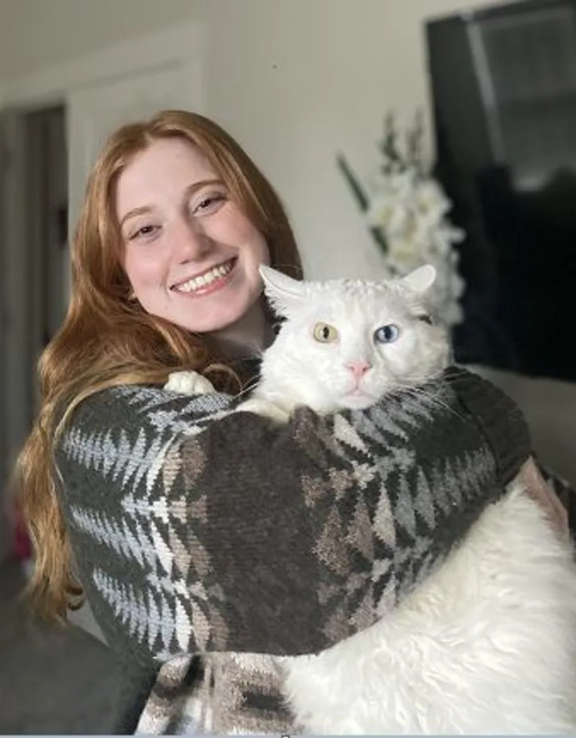 Carlee holding white cat