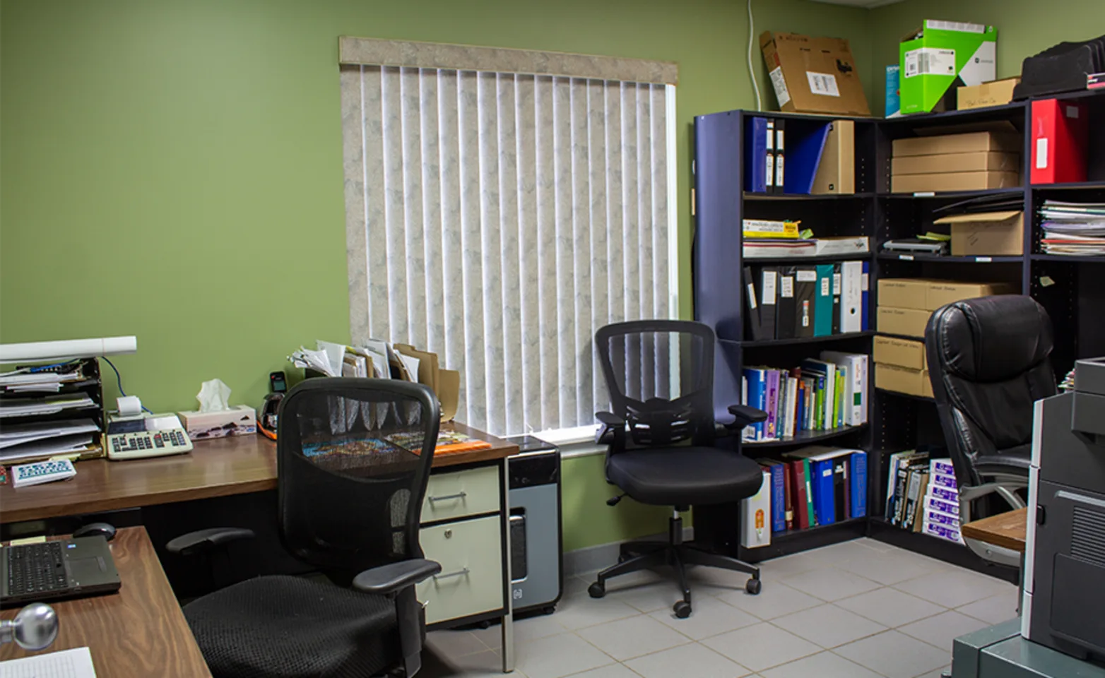 Front office with desks and supplies