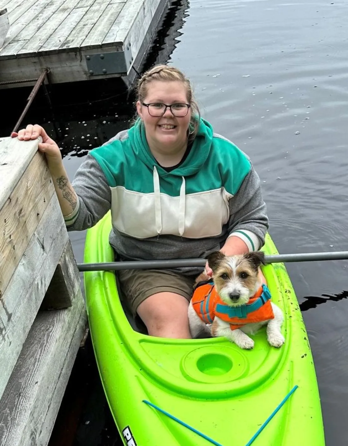 Amber in a kayak with a dog Amber in a kayak with a dog