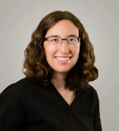 A photo of Dr. Johnson smiling A photo of Dr. Johnson smiling