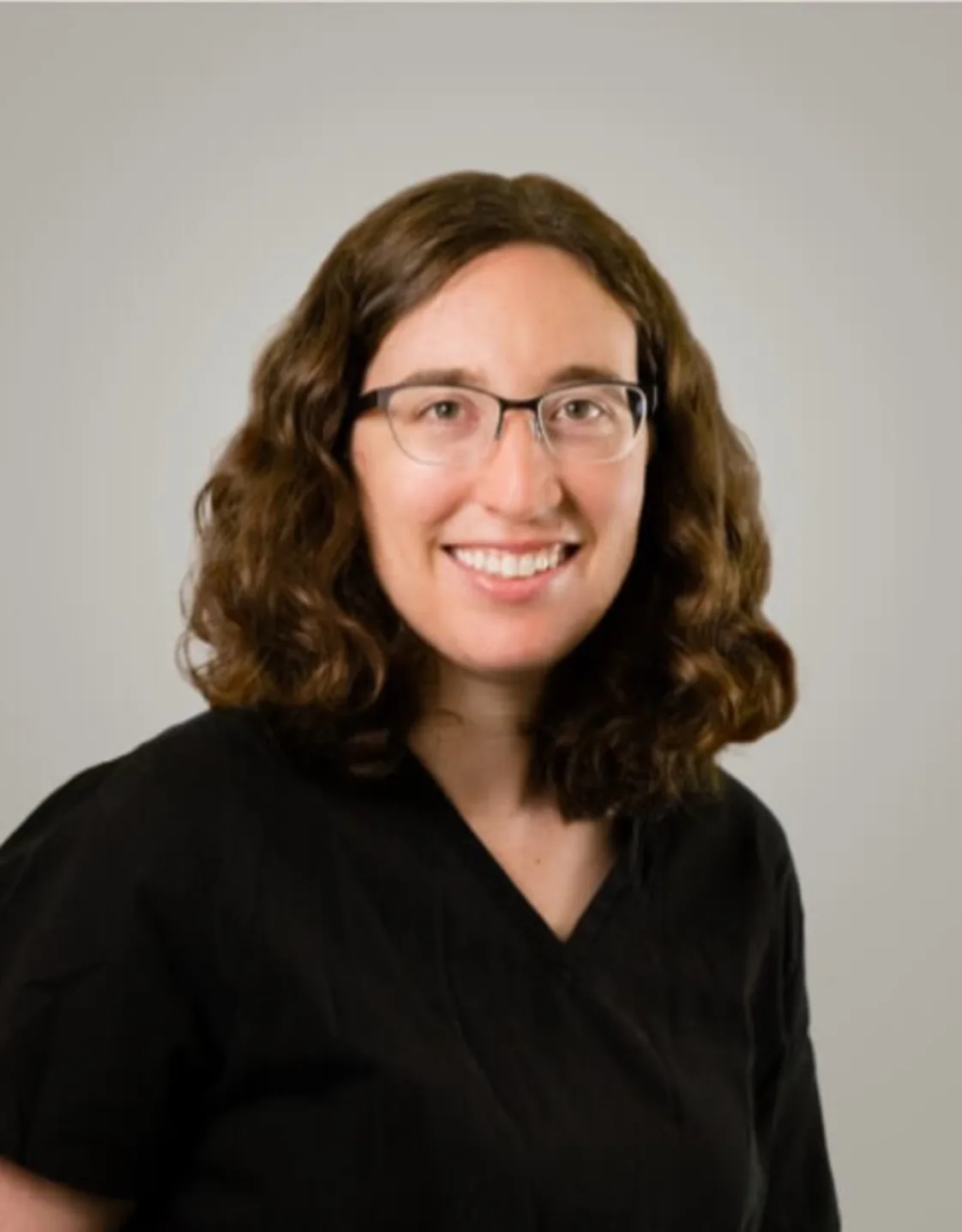 A photo of Dr. Johnson smiling A photo of Dr. Johnson smiling