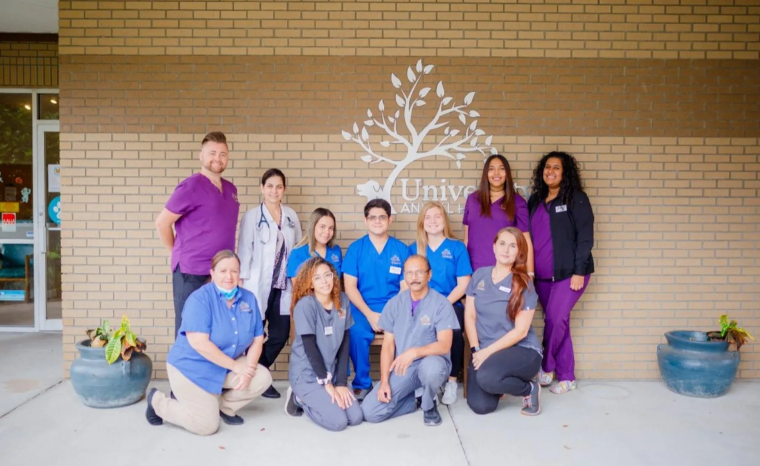 Group staff photo in front of University Animal Hospital Orlando. Group staff photo in front of University Animal Hospital Orlando.