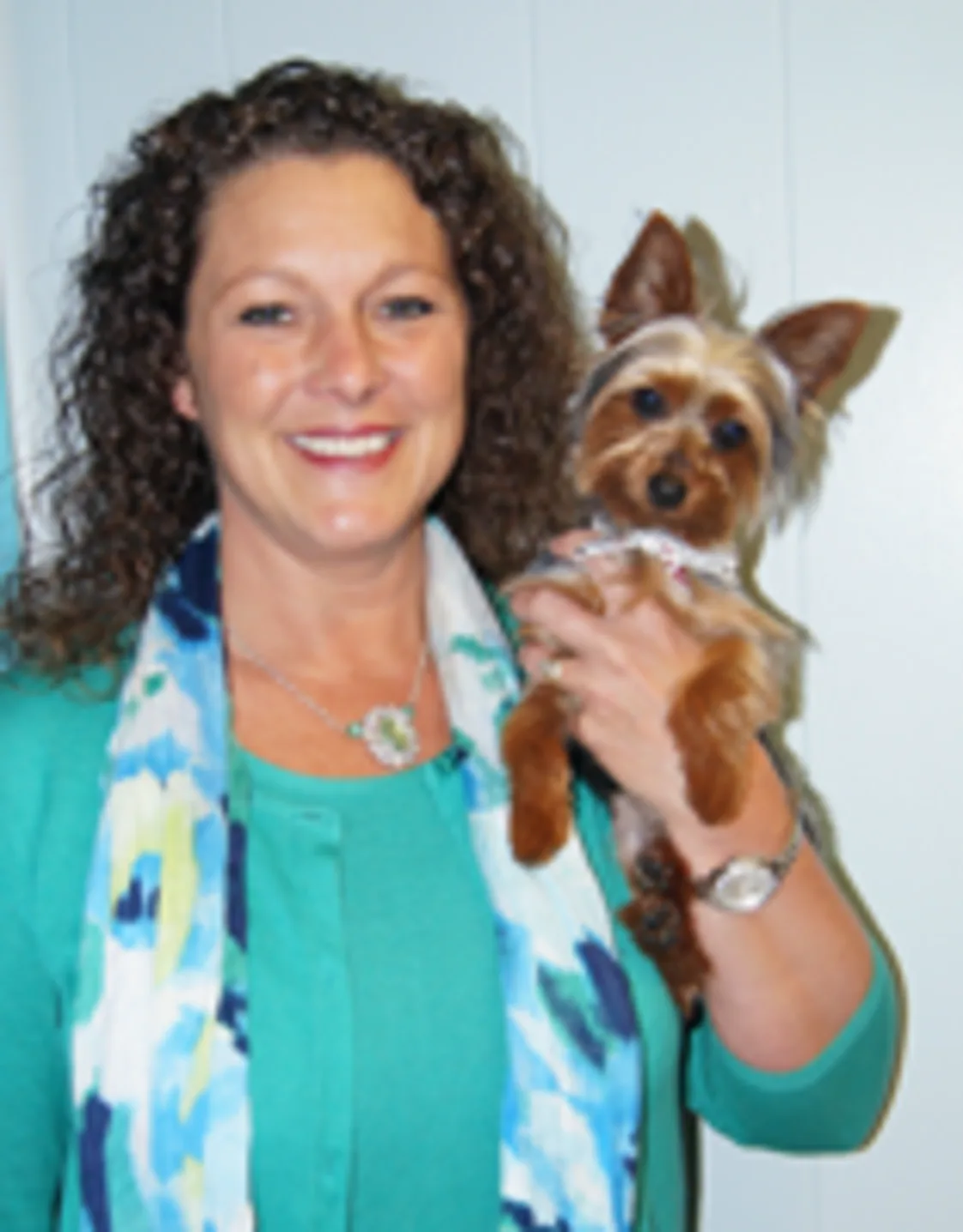 Tobi Burnett with a tiny dog Tobi Burnett with a tiny dog