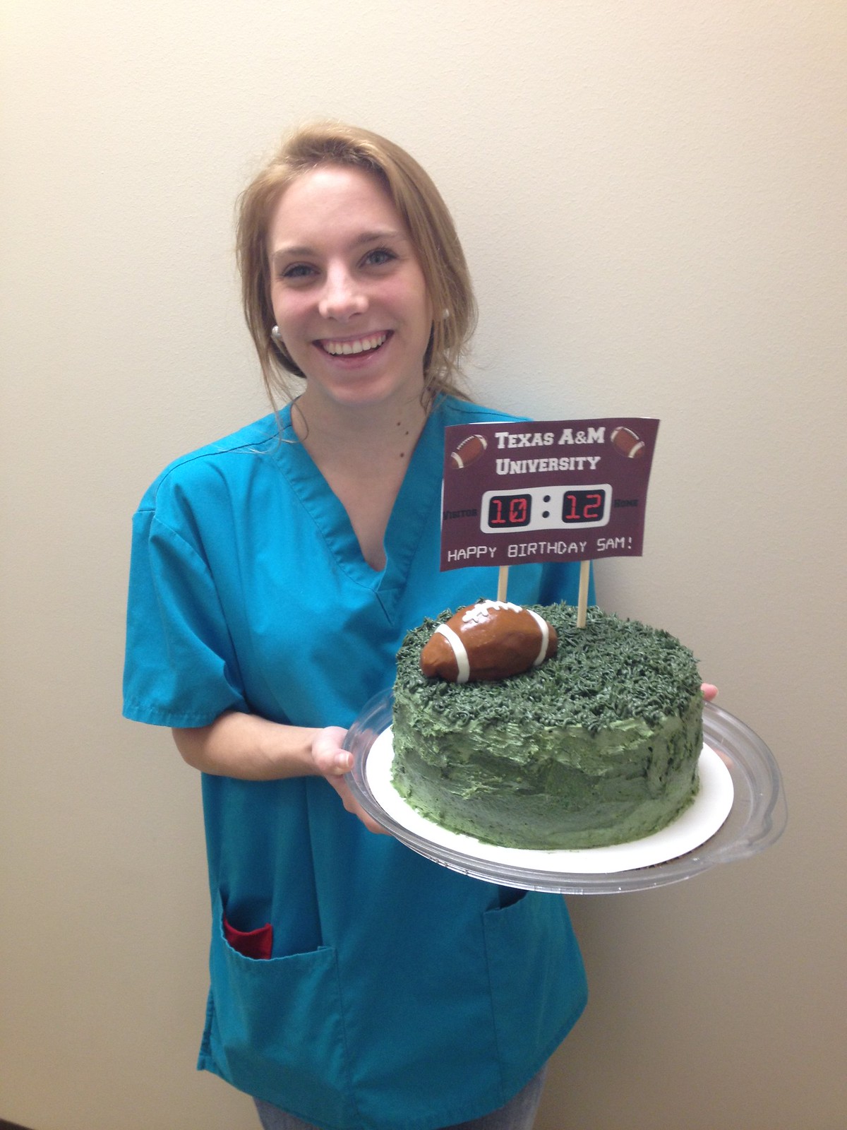 Staff member with cake 