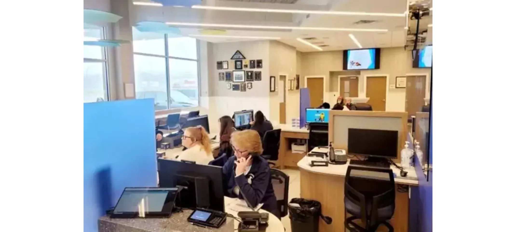 Our Office Space Office space with staff members taking calls