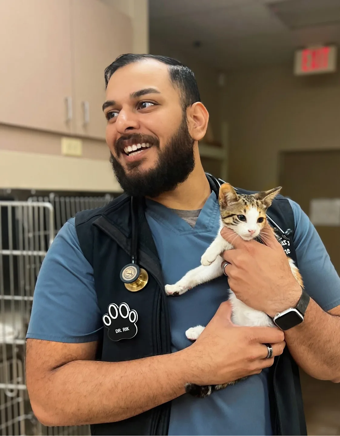 Dr. Rik from Waterford Lakes Animal Hospital with a white husky Dr. Rik from Waterford Lakes Animal Hospital with a white husky