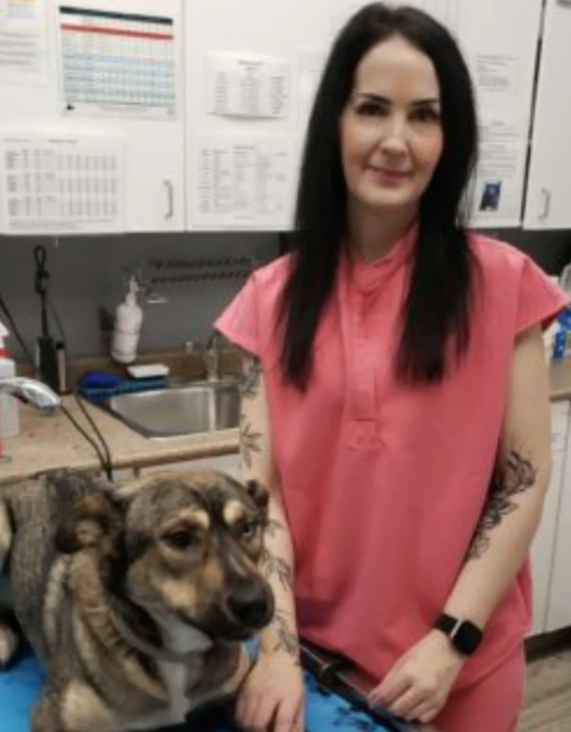 Krista next to a dog Krista next to a dog