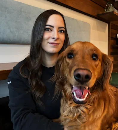 Tessa, staff at Rose Valley Veterinary Hospital, posing with dog Tessa, staff at Rose Valley Veterinary Hospital, posing with dog