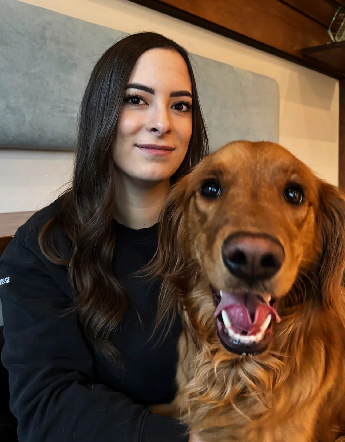 Tessa, staff at Rose Valley Veterinary Hospital, posing with dog Tessa, staff at Rose Valley Veterinary Hospital, posing with dog