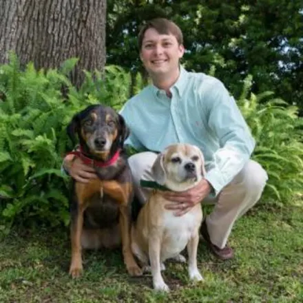 Joe Vaccaro with two dogs