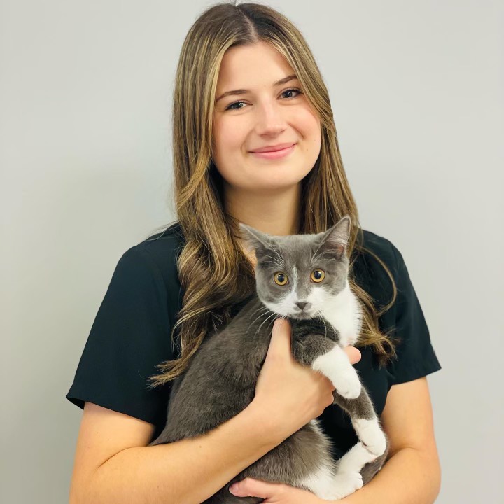 Photo of Dr Eles with Dog 