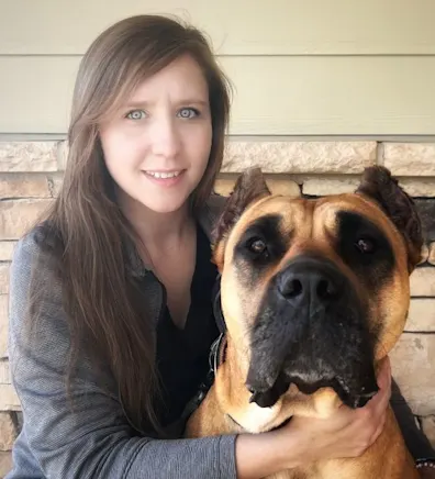 Jessica Banks with a large brown dog Jessica Banks with a large brown dog