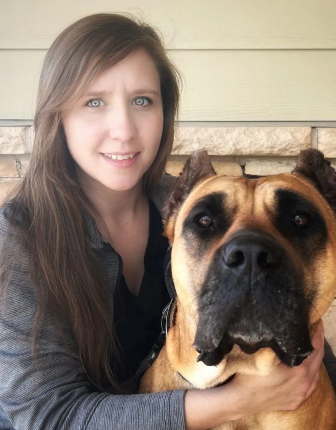 Jessica Banks with a large brown dog Jessica Banks with a large brown dog