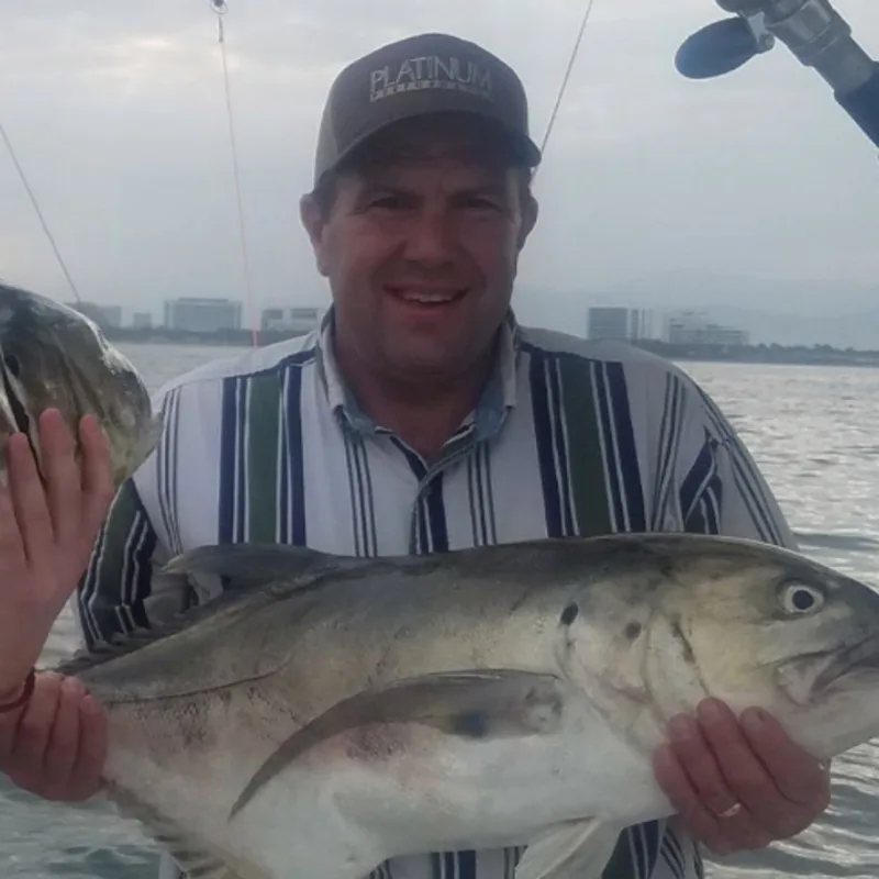 Dr. McKinzie holding a big fish Dr. McKinzie holding a big fish