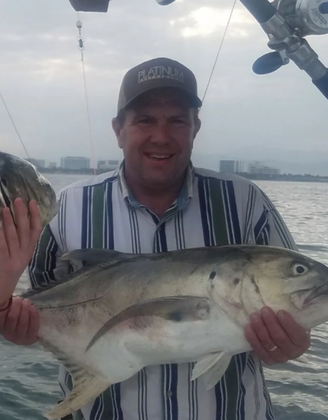 Dr. McKinzie holding a big fish Dr. McKinzie holding a big fish