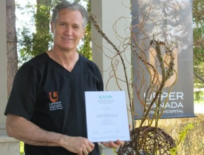 Dr. Turpel holding International Surgical Award Dr. Turpel holding International Surgical Award