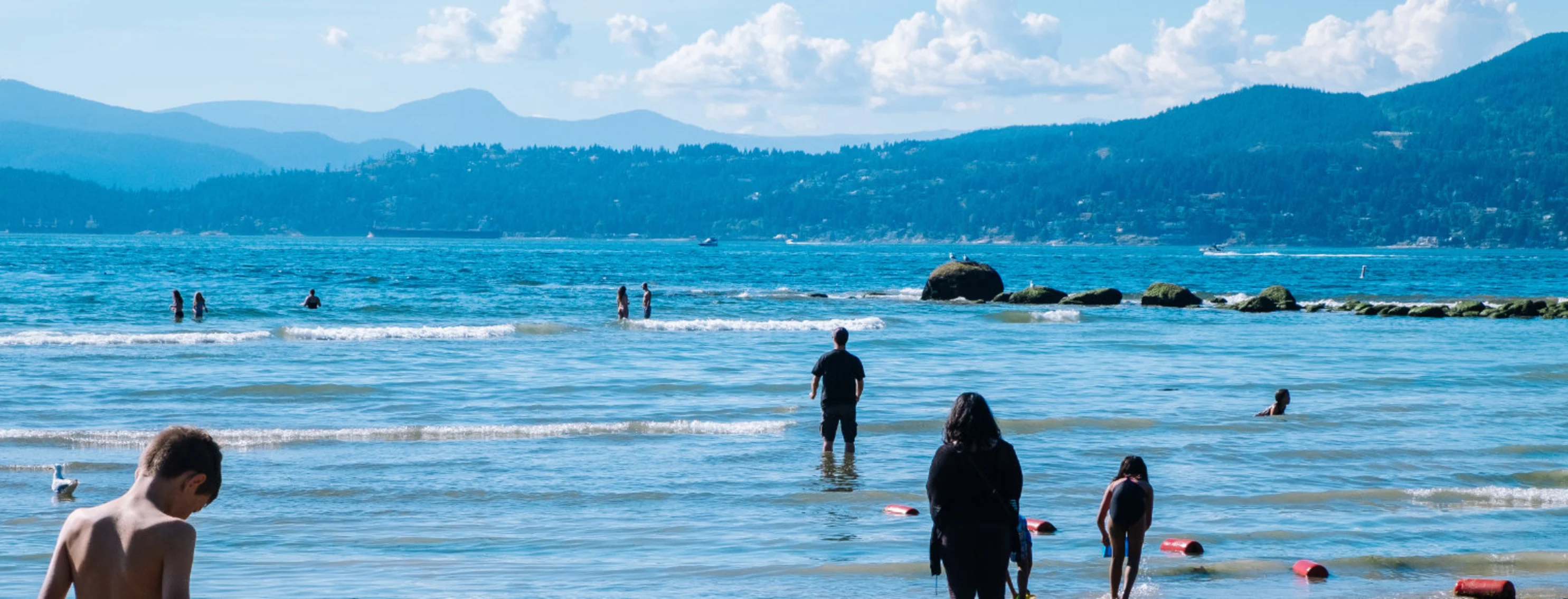 Families swimming at Stanley Park in Vancouver