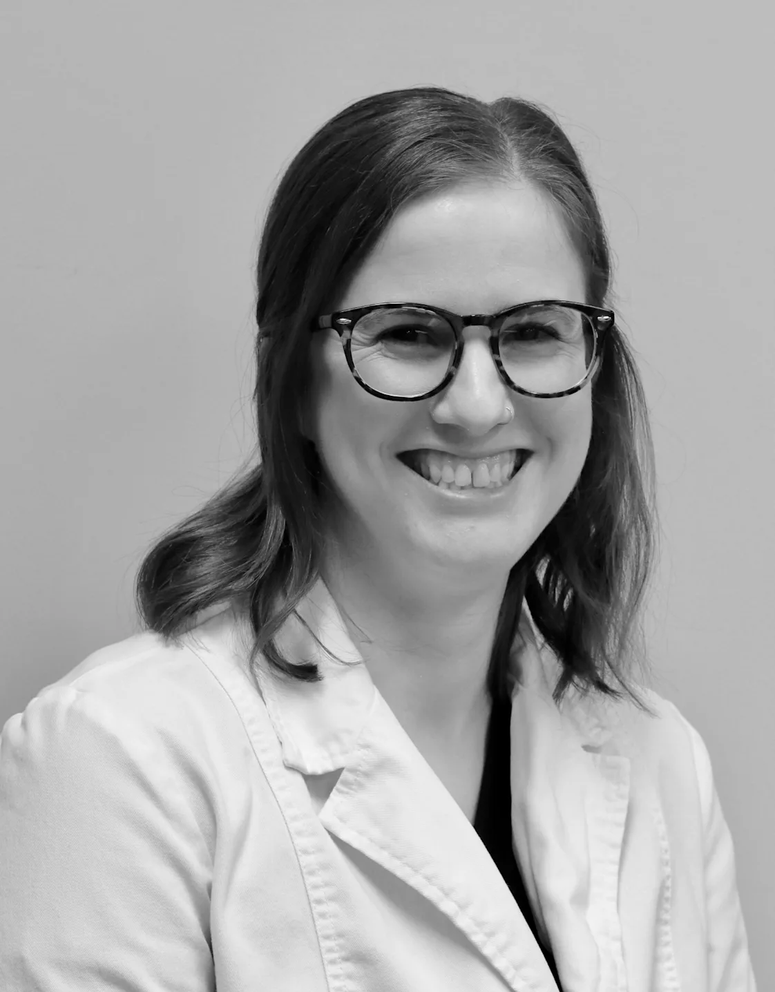 Dr. Haley Robbins smiling in front of the camera. Dr. Haley Robbins smiling in front of the camera.