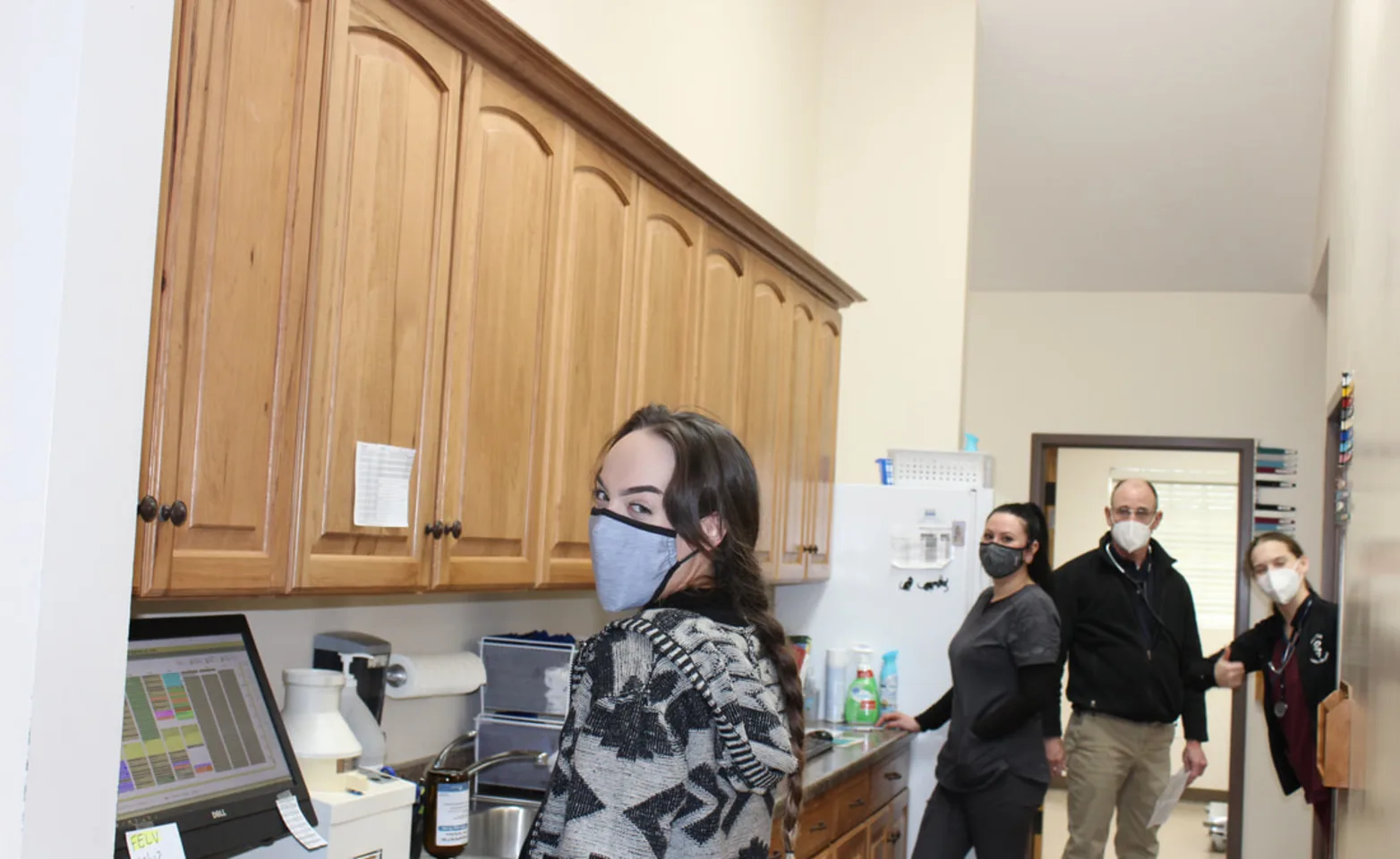 Hunter Animal Hospital staff in a hallway of the hospital 