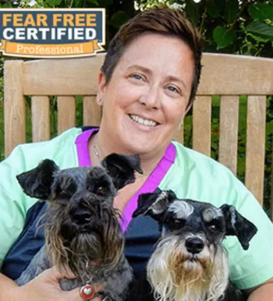 headshot of Lori with her two miniature Schnauzers headshot of Lori with her two miniature Schnauzers