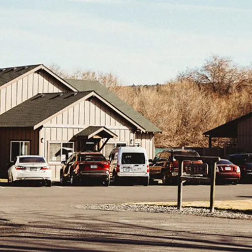 Picture of the front of Prineville Veterinary Clinic's with their Equine Stable next to their main building.