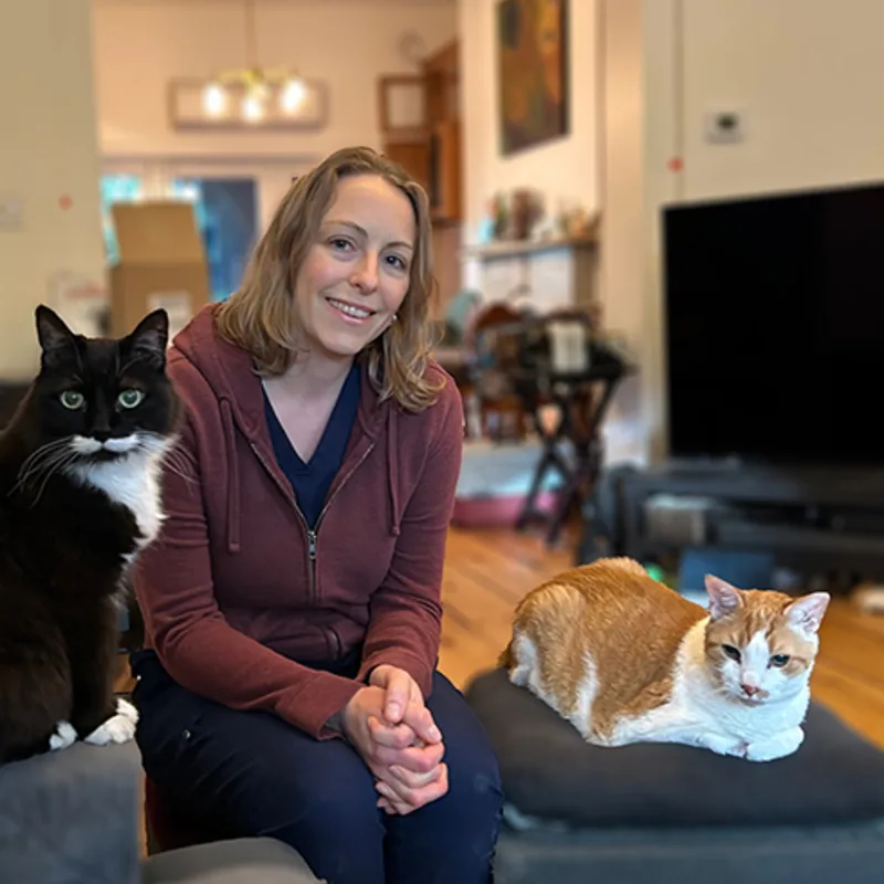 Dr. Catherine Czaya with two cats Dr. Catherine Czaya with two cats