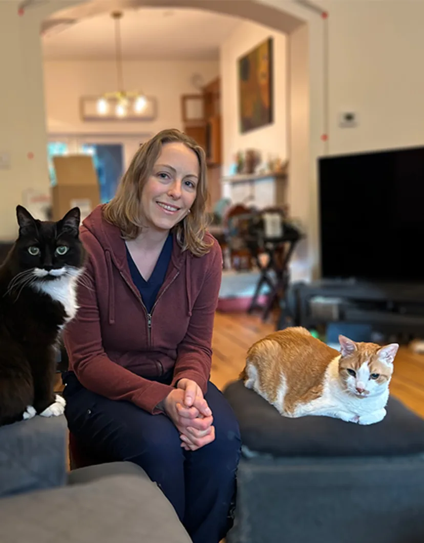 Dr. Catherine Czaya with two cats