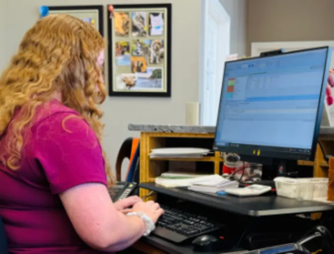 Staff using computer Staff using computer