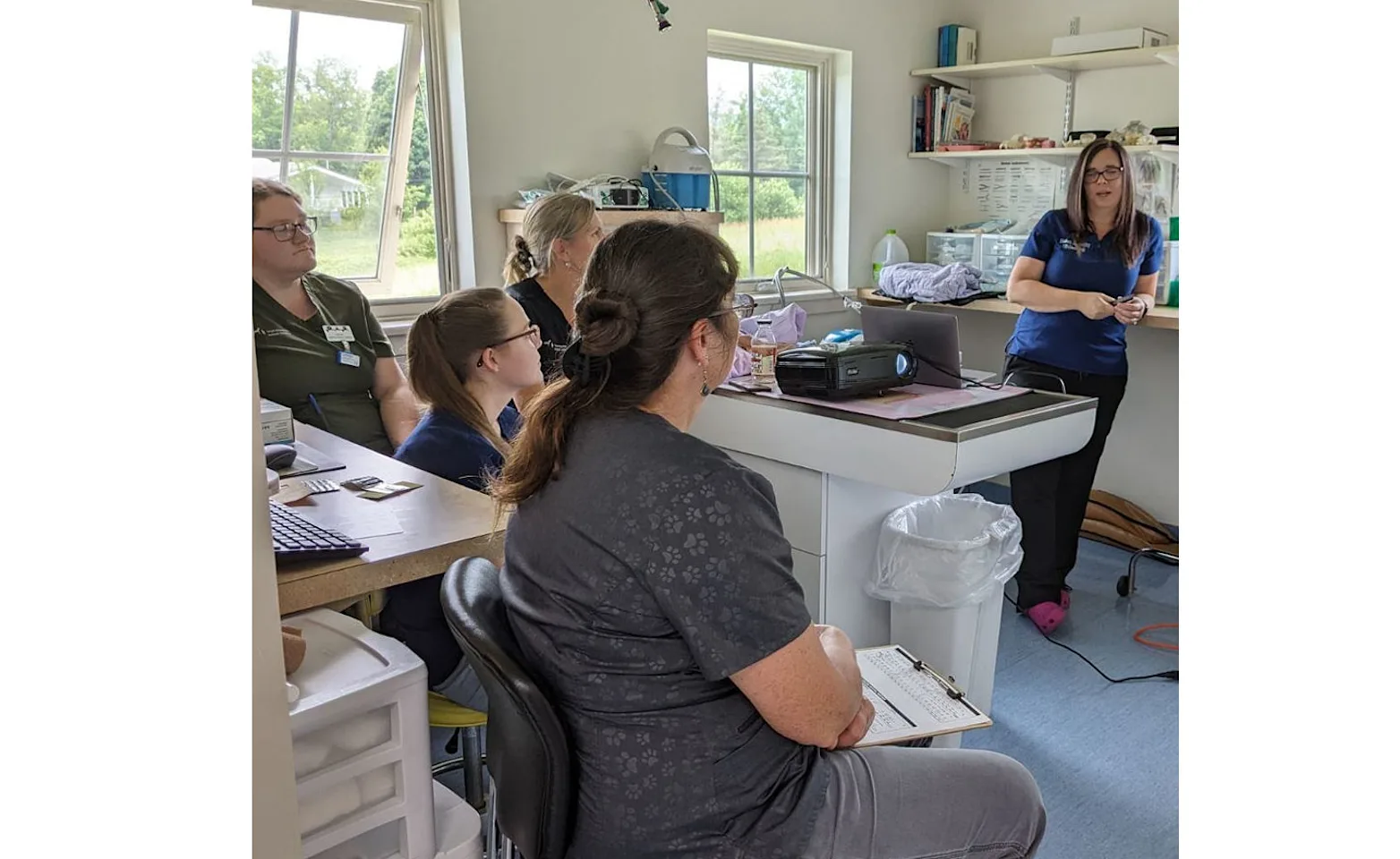 Staff sitting in a backroom of West Mountain Animal Hospital Staff sitting in a backroom of West Mountain Animal Hospital