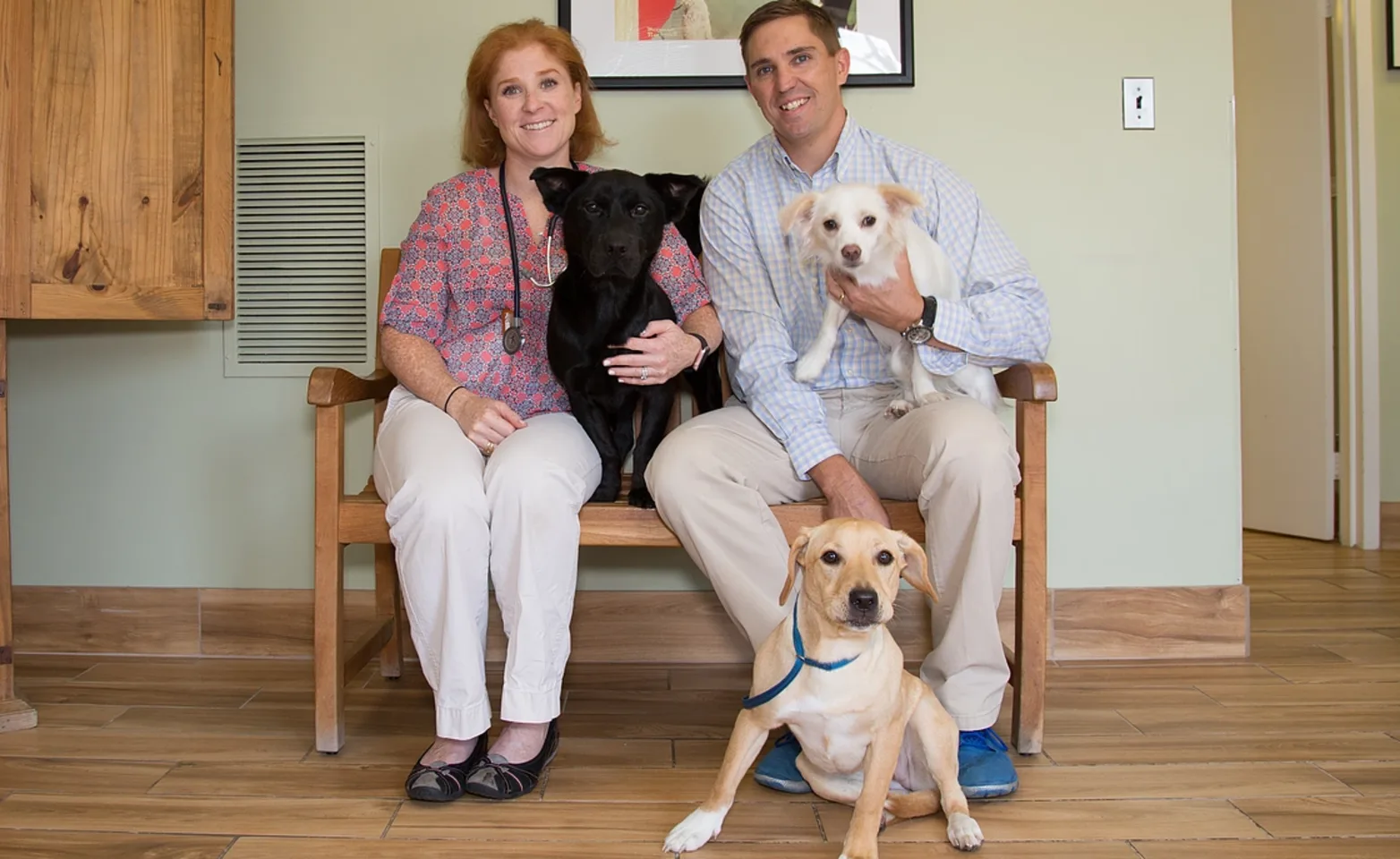 Dr. Tubbs & Goldman posing with 3 dogs Dr. Tubbs & Goldman posing with 3 dogs