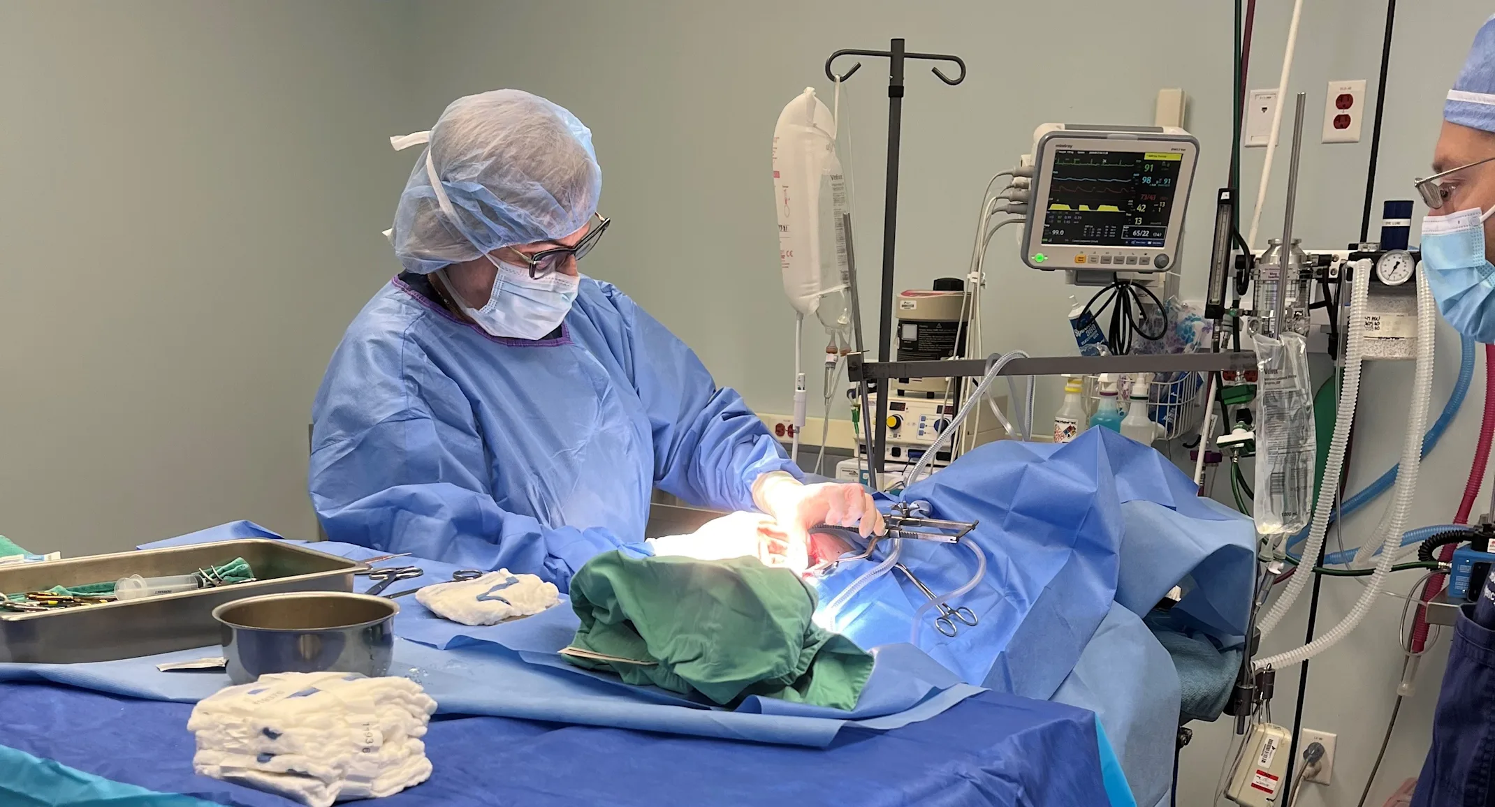 Dr. Culbert performing surgery Dr. Culbert performing surgery