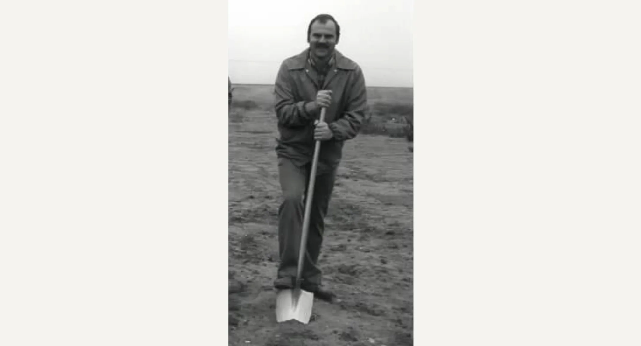 Dr. Duane Schnittker breaking ground with a shovel