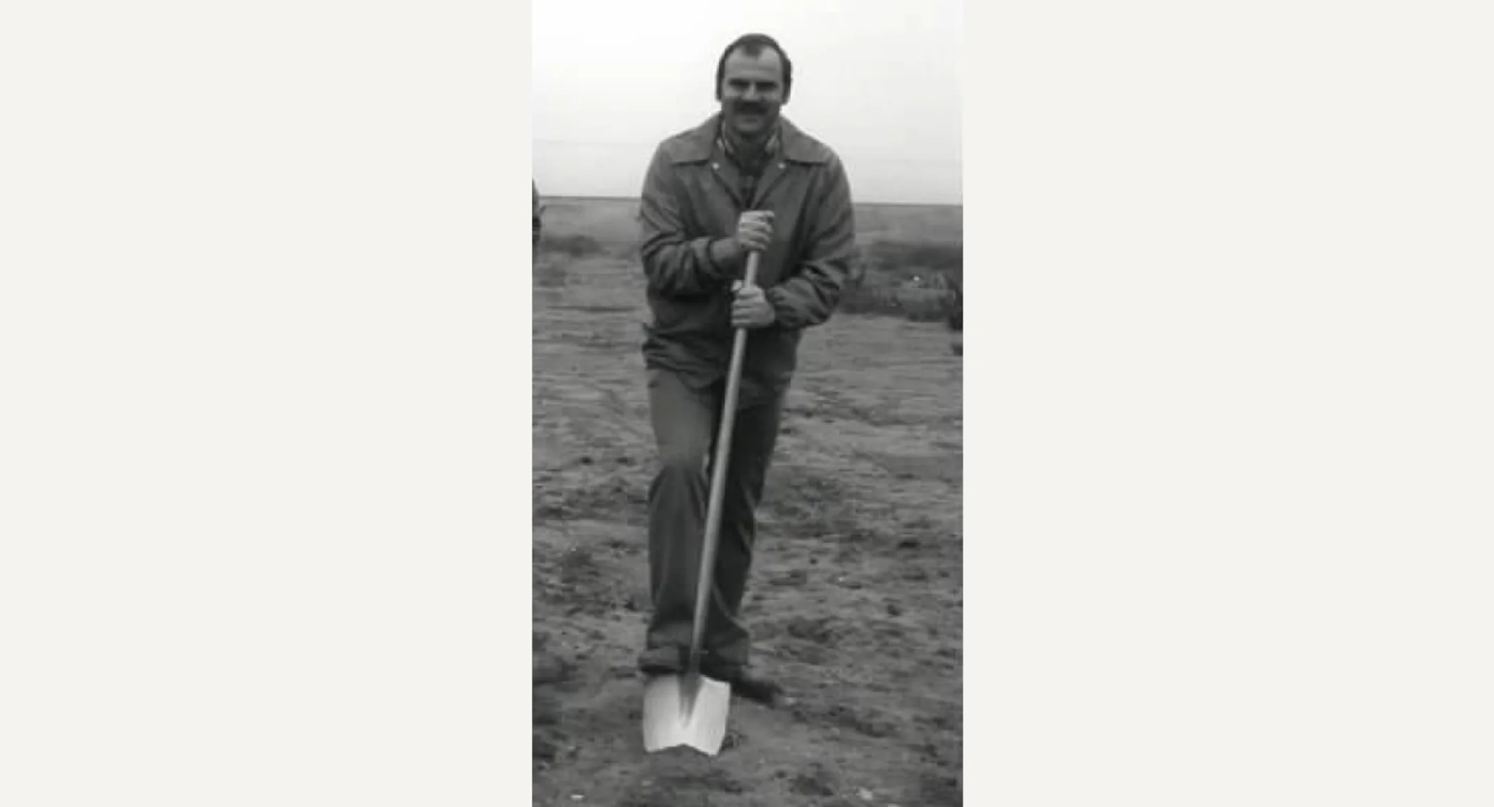 Dr. Duane Schnittker breaking ground with a shovel Dr. Duane Schnittker breaking ground with a shovel