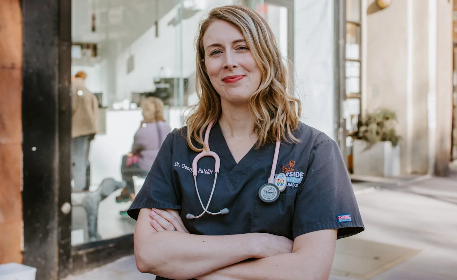 Dr. Georgia Ratcliff standing on the sidewalk in front of Riverside Veterinary Care Dr. Georgia Ratcliff standing on the sidewalk in front of Riverside Veterinary Care